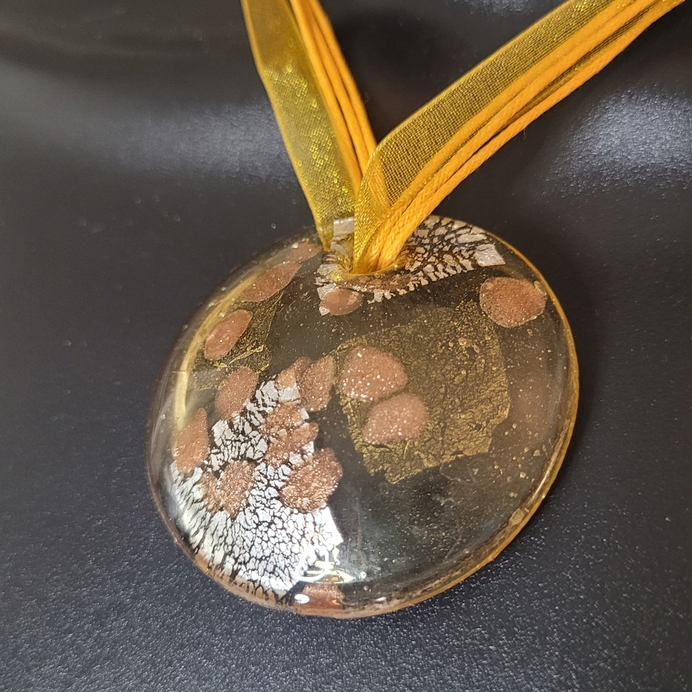 Gold circle pendant